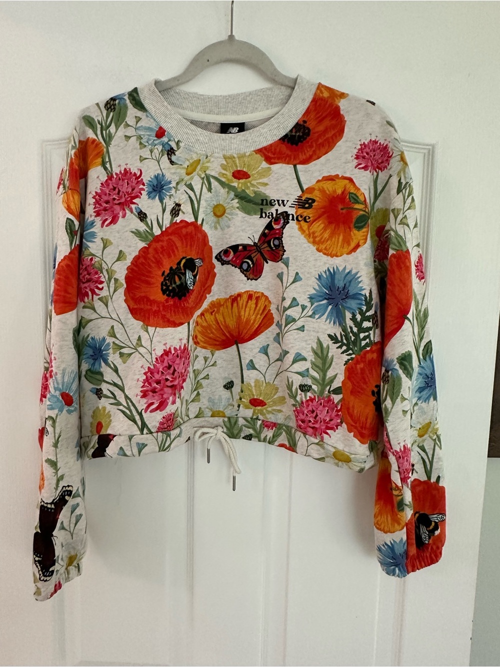 New Balance NWOT Women's Floral Drawstring Hem Sweatshirt - Orange, Pink, Blue